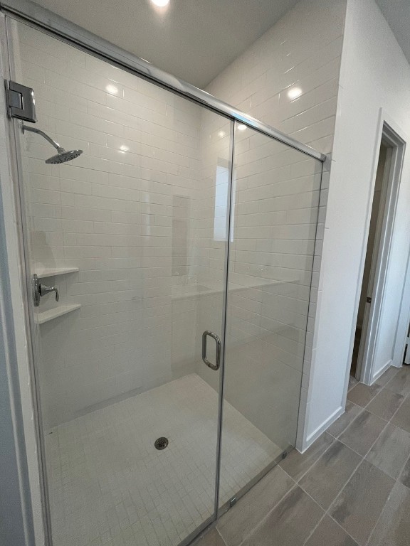 4411 Eagle Pass Drive Rosenberg, TX 77469 - Photo 21 of 33 a bathroom with a glass door shower