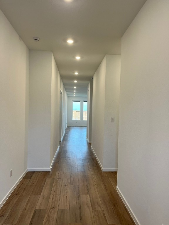 4411 Eagle Pass Drive Rosenberg, TX 77469 - Photo 4 of 33 a view of a hallway with wooden floor