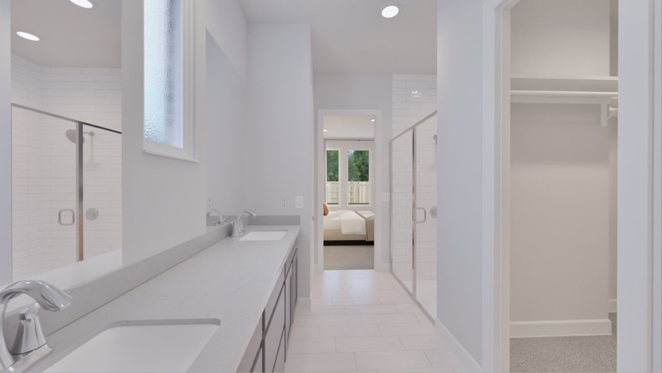 4411 Eagle Pass Drive Rosenberg, TX 77469 - Photo 28 of 33 a en suite bathroom with a sink a toilet and shower