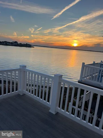 a view of a balcony with an ocean view