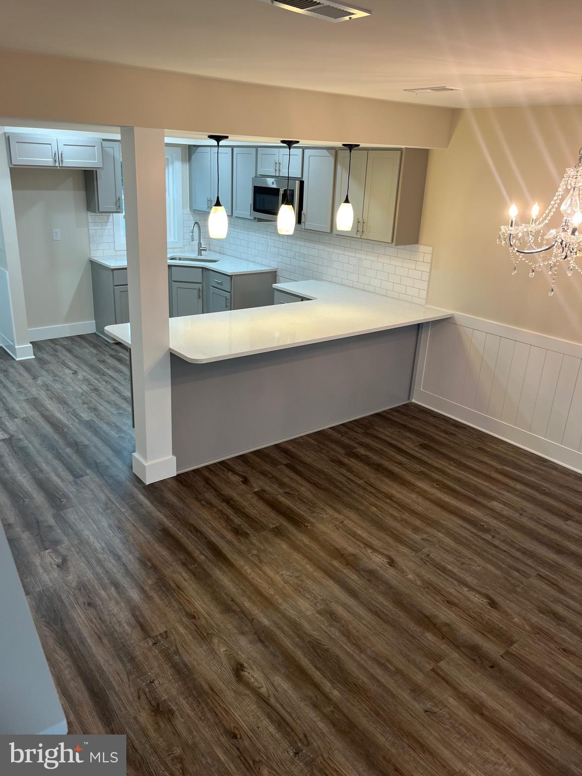 163 Jamestown Road Ocean City, MD 21842 - Photo 8 of 8 a bathroom with a sink and a mirror