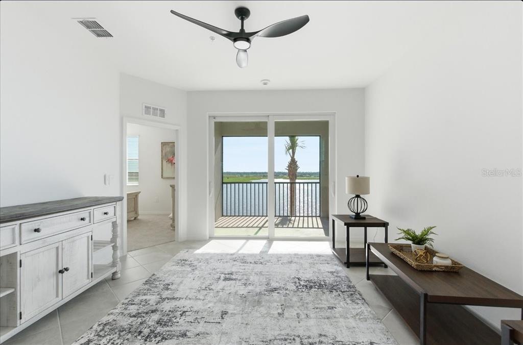 19140 Scallop Loop, Unit 308 Lakewood Ranch, FL 34211 - Photo 8 of 19 a living room with furniture