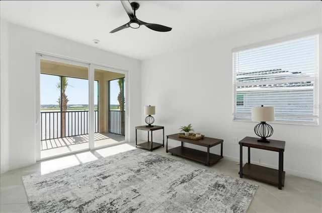 a bedroom with furniture and a window