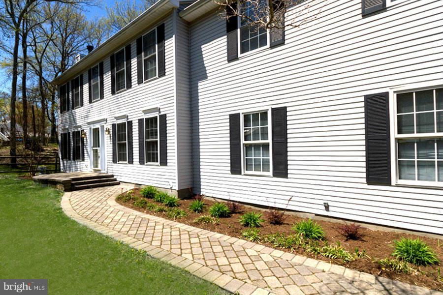 3908 Rhode Harbor Road Edgewater, MD 21037 - Photo 7 of 30 Lovely Landscaping / Paver Front Walk