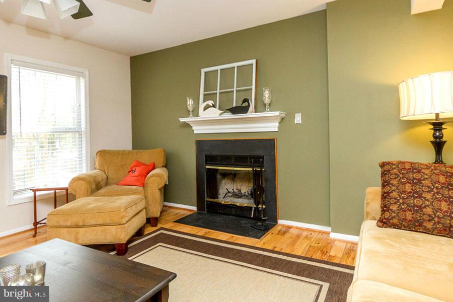 3908 Rhode Harbor Road Edgewater, MD 21037 - Photo 9 of 30 Living Room Showcasing Hickory Flooring