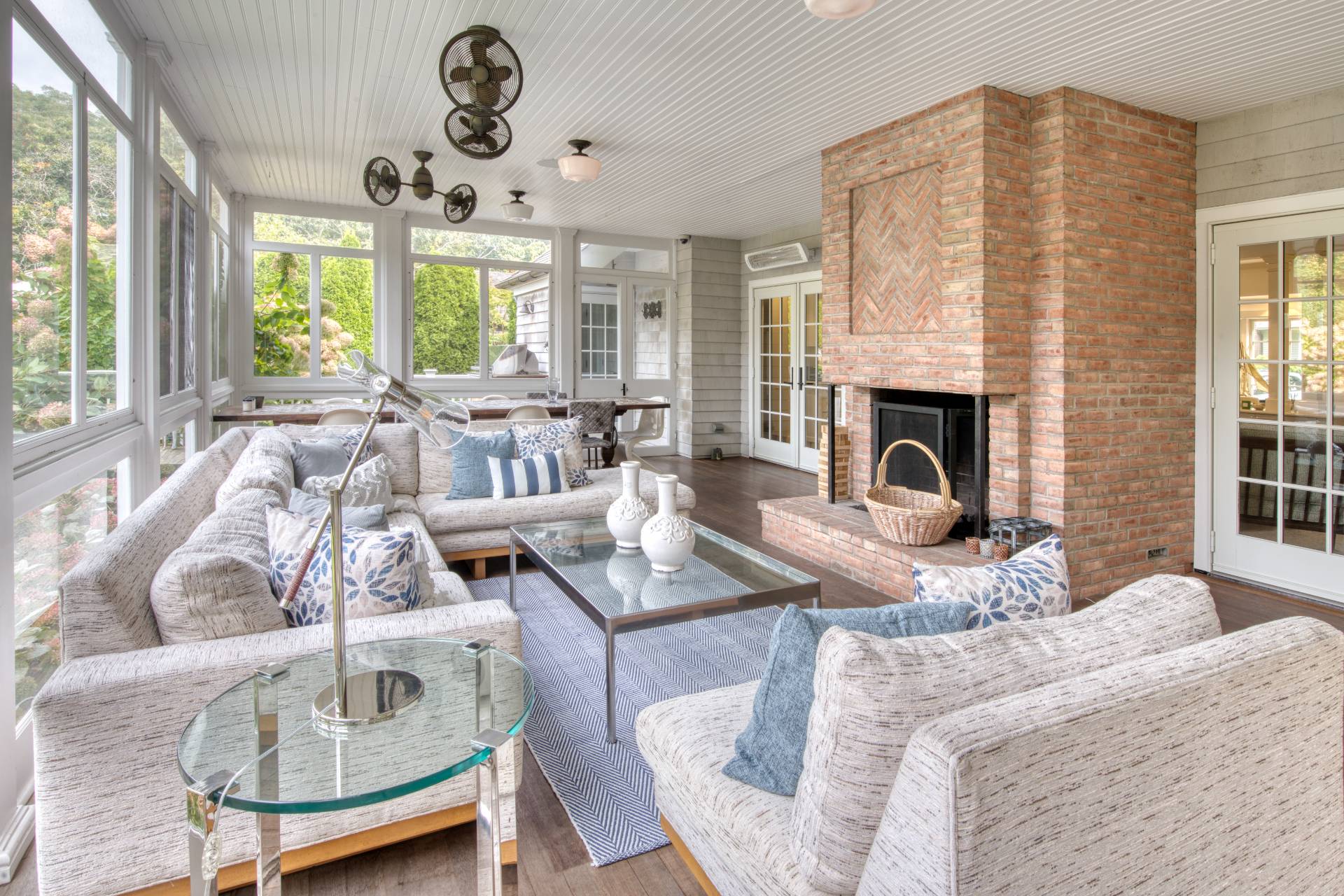 69 Harrison Street Sag Harbor, NY 11963 - Photo 8 of 17 a living room with fireplace furniture and a large window