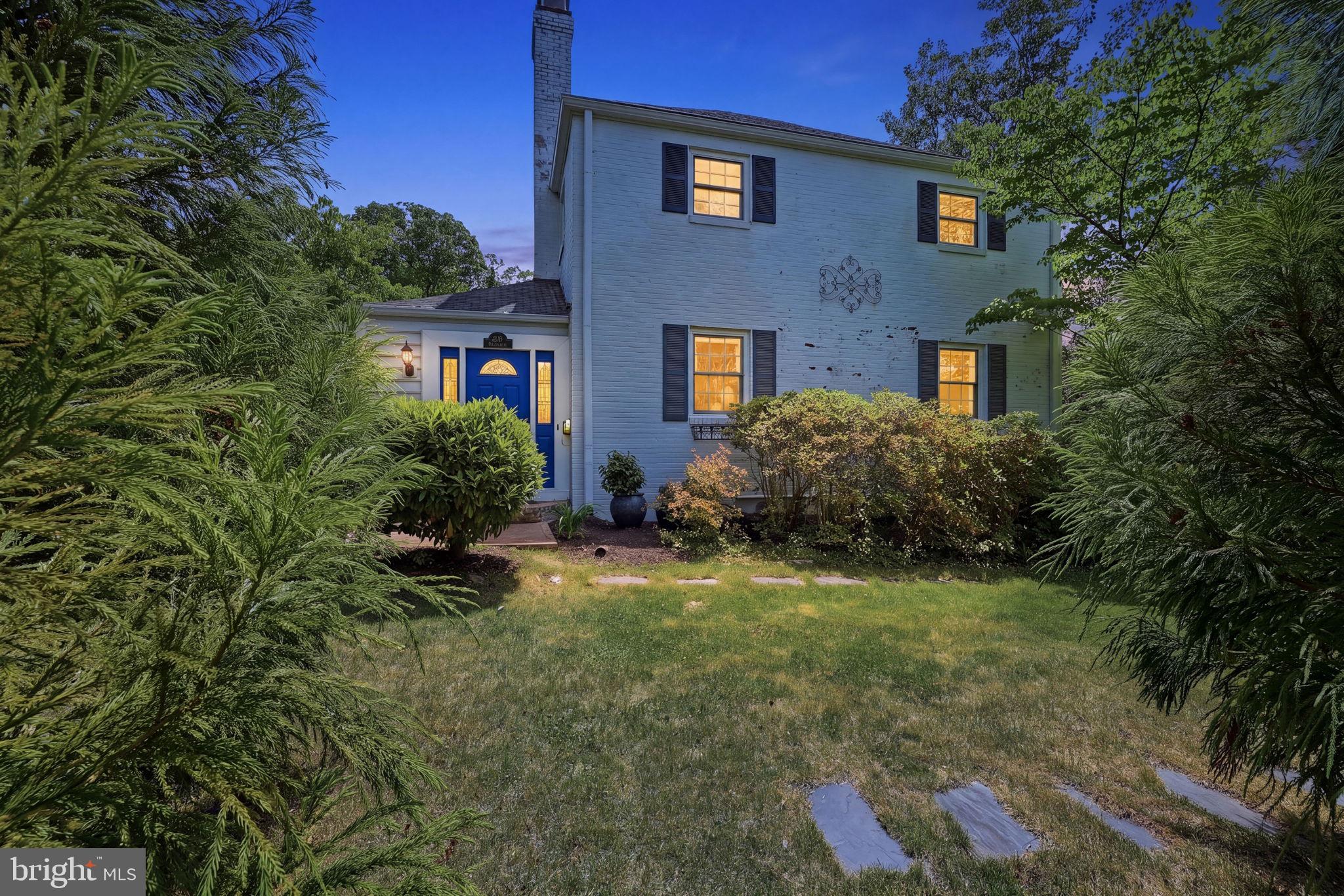 7601 Hollins Road Henrico, VA 23229 - Photo 1 of 47 a view of a brick house with a yard