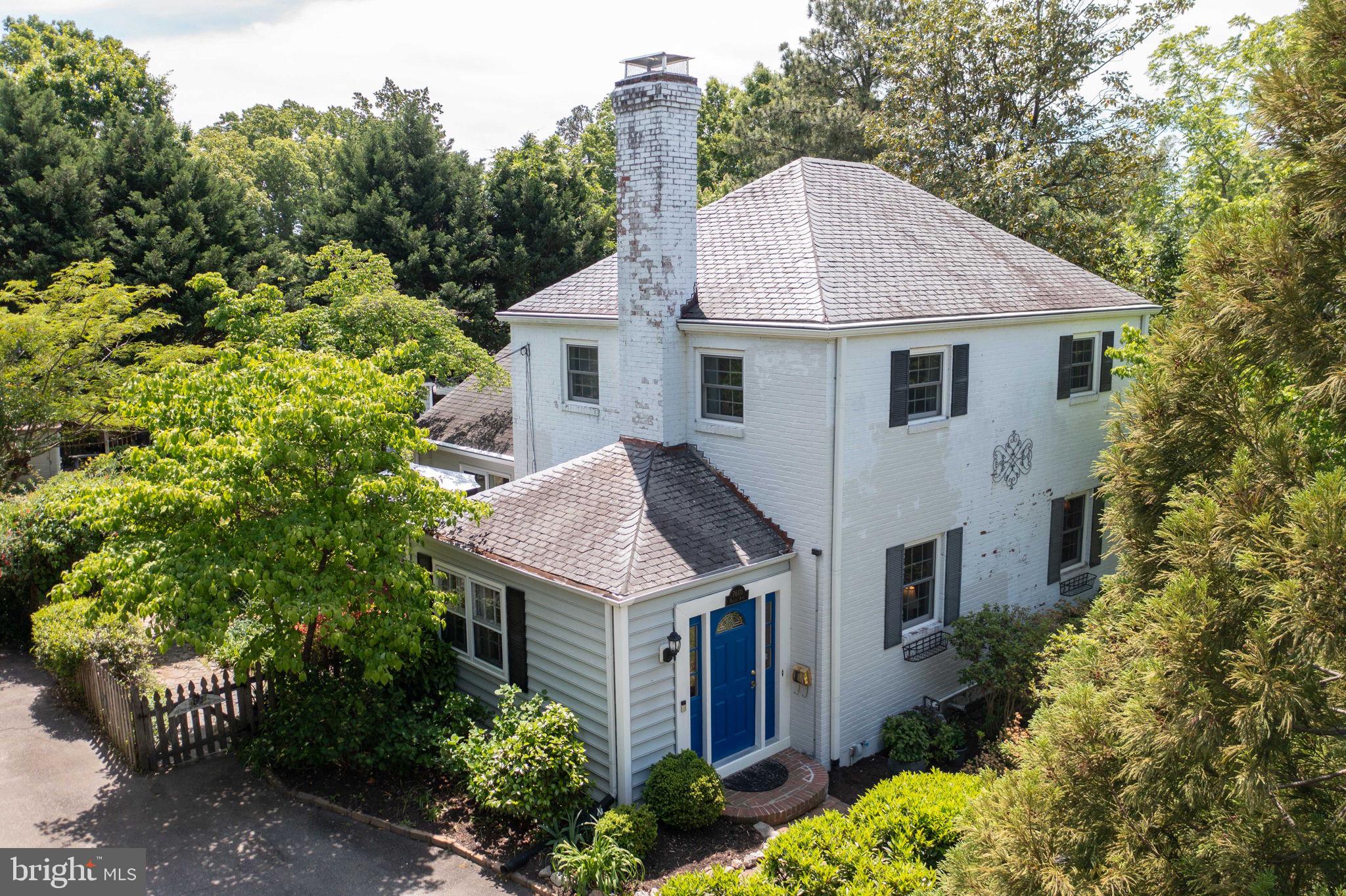 7601 Hollins Road Henrico, VA 23229 - Photo 32 of 47 aerial view of a house with a yard and potted plants