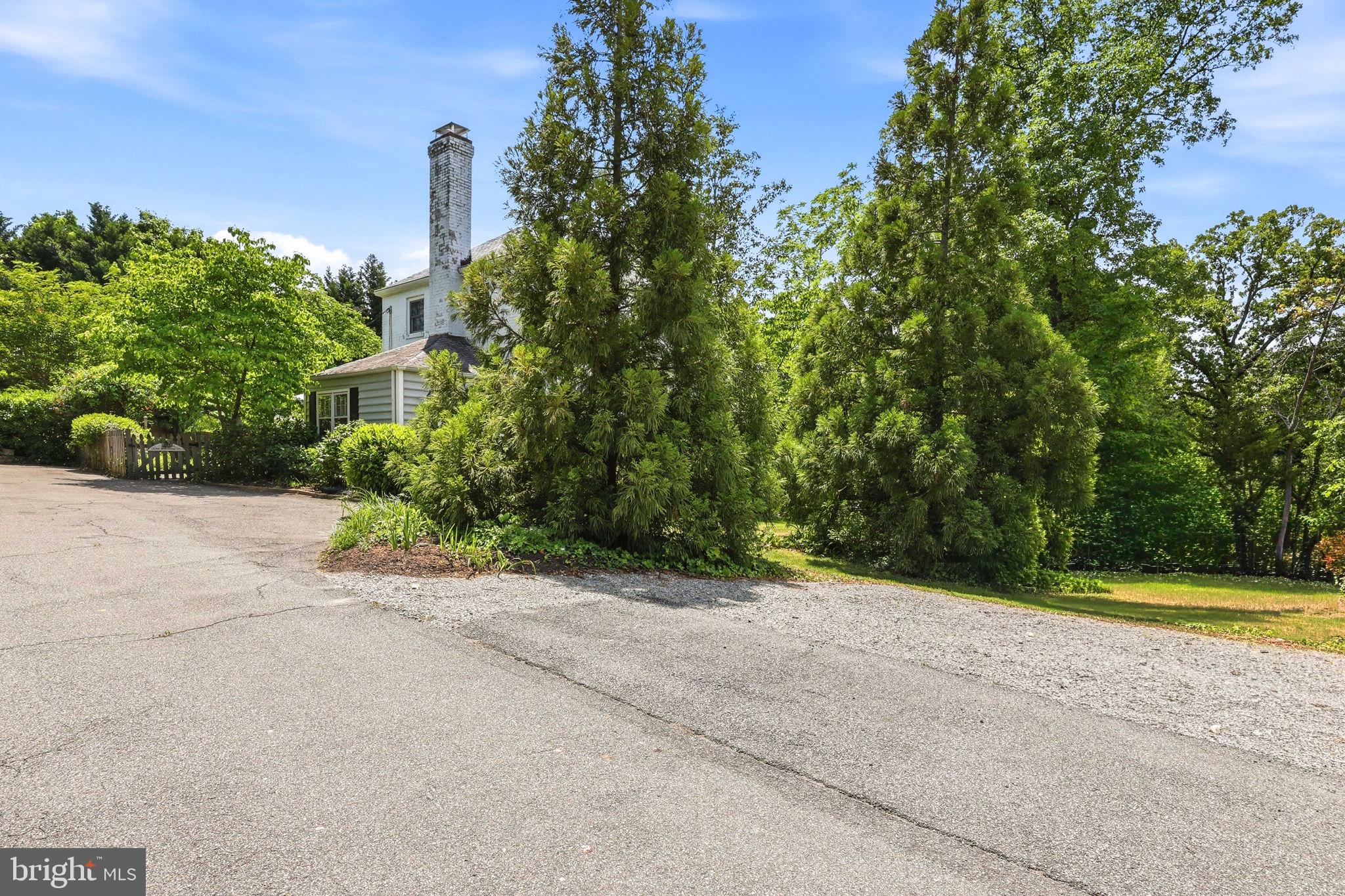 7601 Hollins Road Henrico, VA 23229 - Photo 33 of 47 a view of a house with a yard and a street