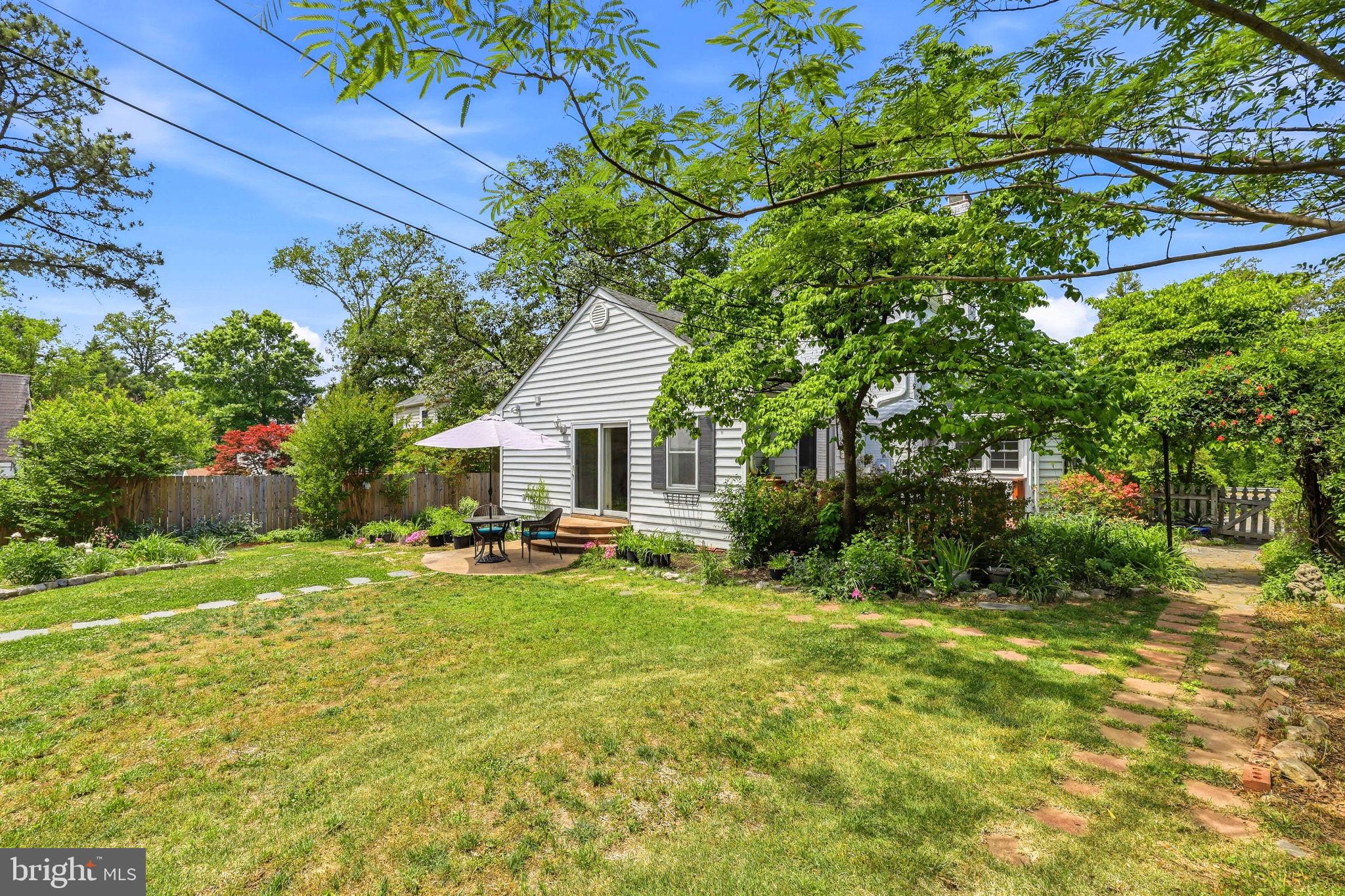 7601 Hollins Road Henrico, VA 23229 - Photo 39 of 47 a view of a house with a yard and sitting area