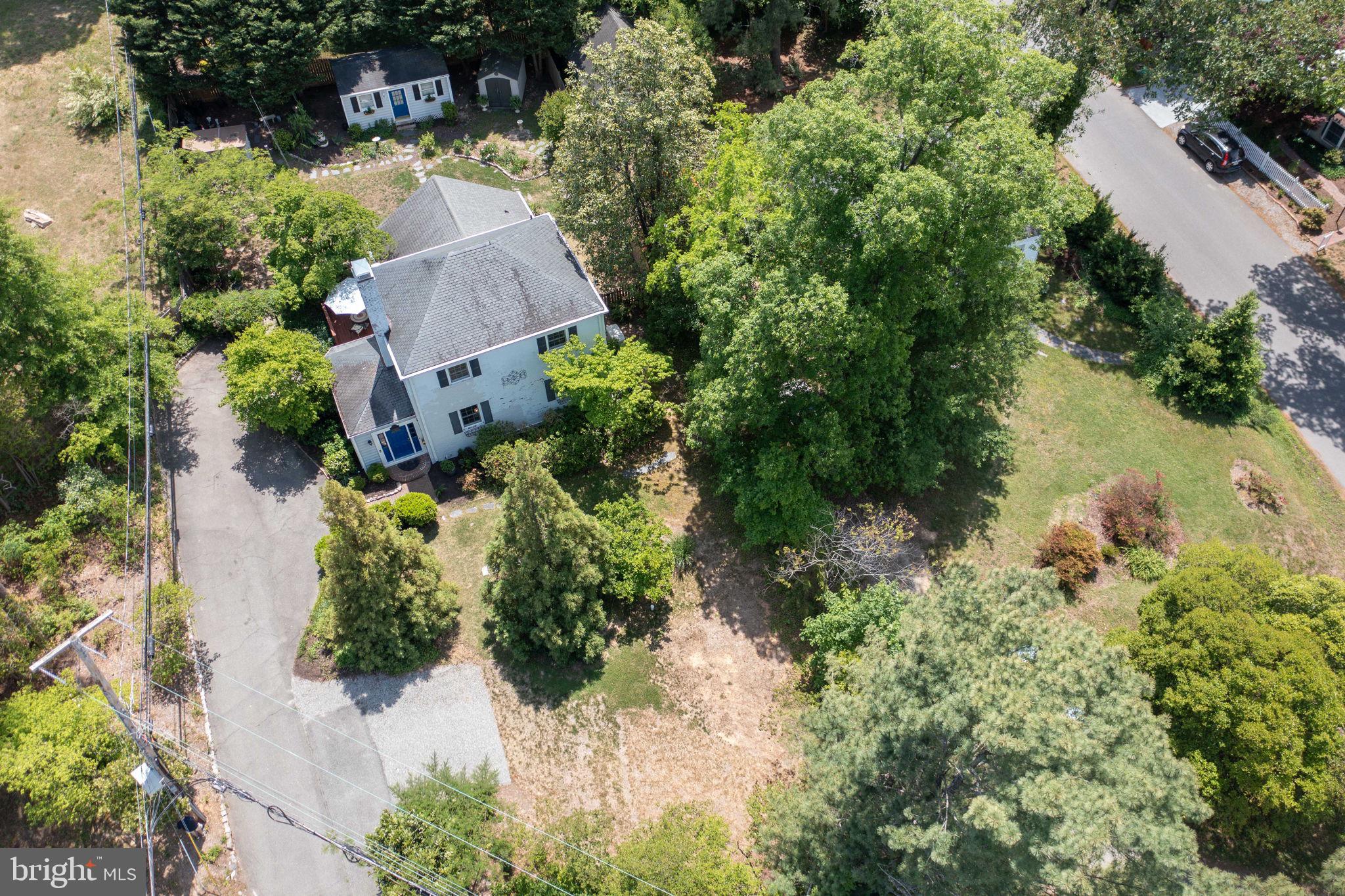 7601 Hollins Road Henrico, VA 23229 - Photo 42 of 47 an aerial view of a house with a yard and lake view