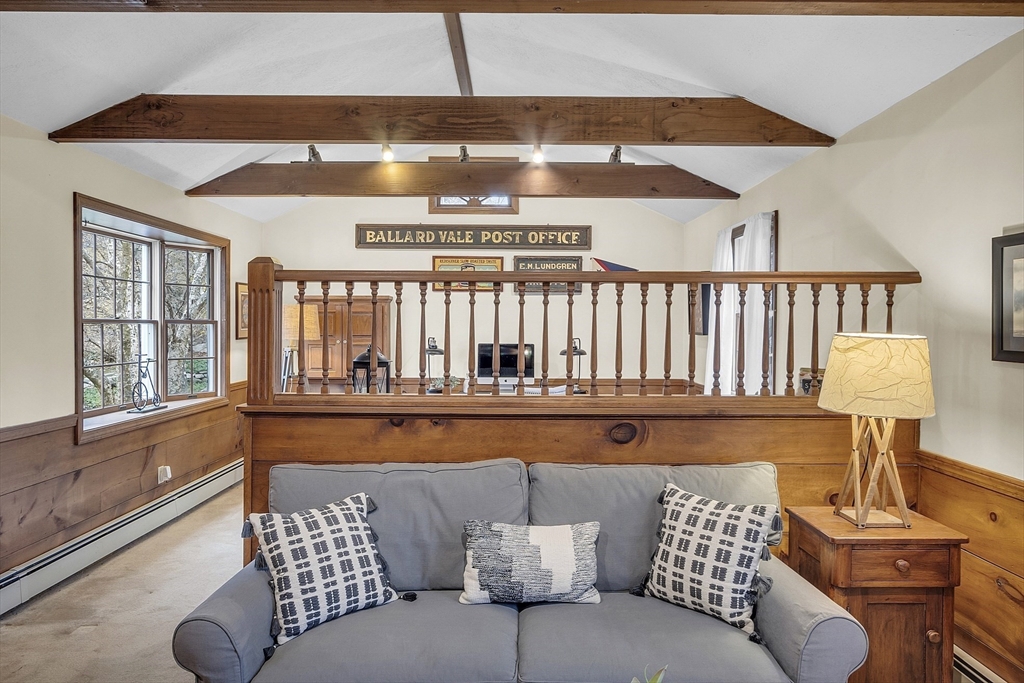 9 Carlisle Street Andover, MA 01810 - Photo 25 of 42 a living room with furniture and a window