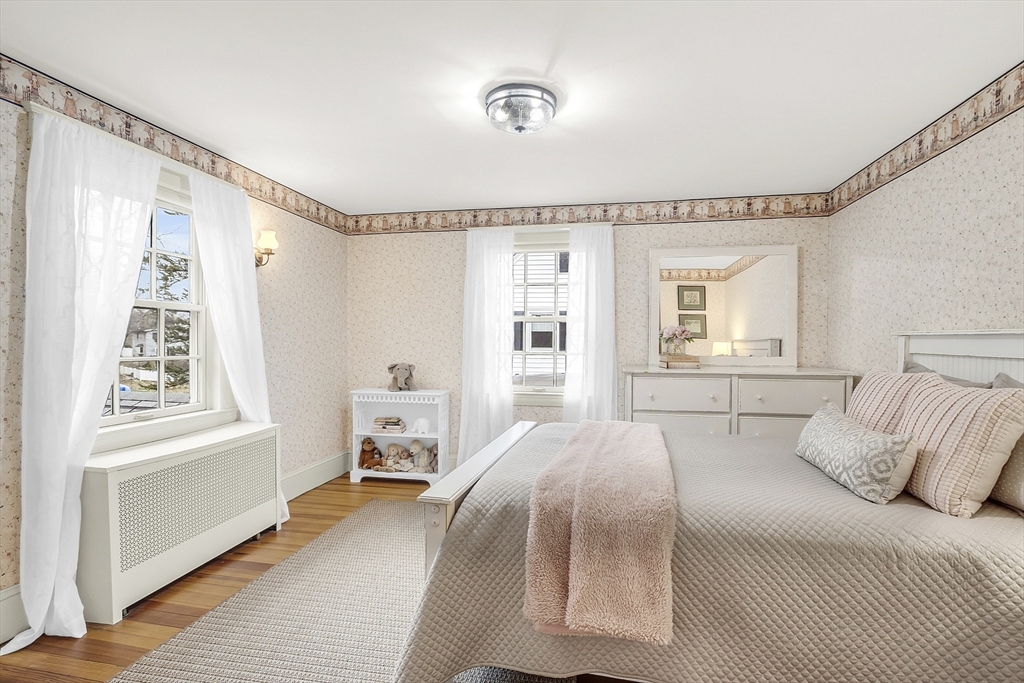 9 Carlisle Street Andover, MA 01810 - Photo 32 of 42 a spacious bedroom with a large bed and a window