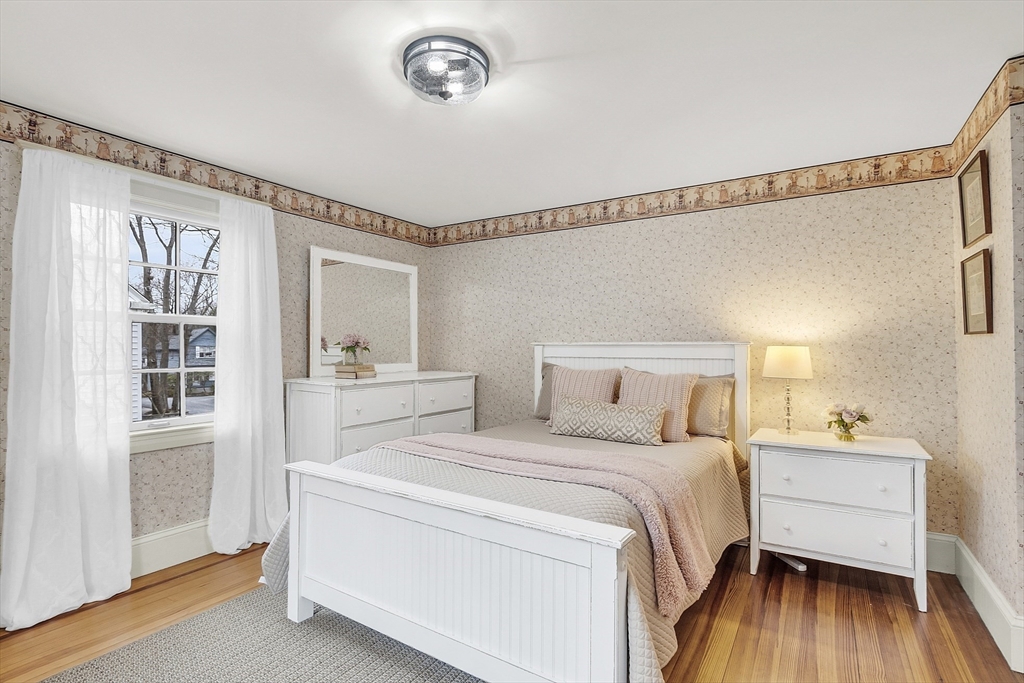 9 Carlisle Street Andover, MA 01810 - Photo 33 of 42 a bedroom with a bed and a window