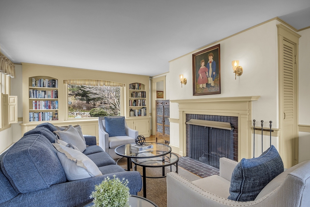 9 Carlisle Street Andover, MA 01810 - Photo 7 of 42 a living room with furniture fireplace and a large window