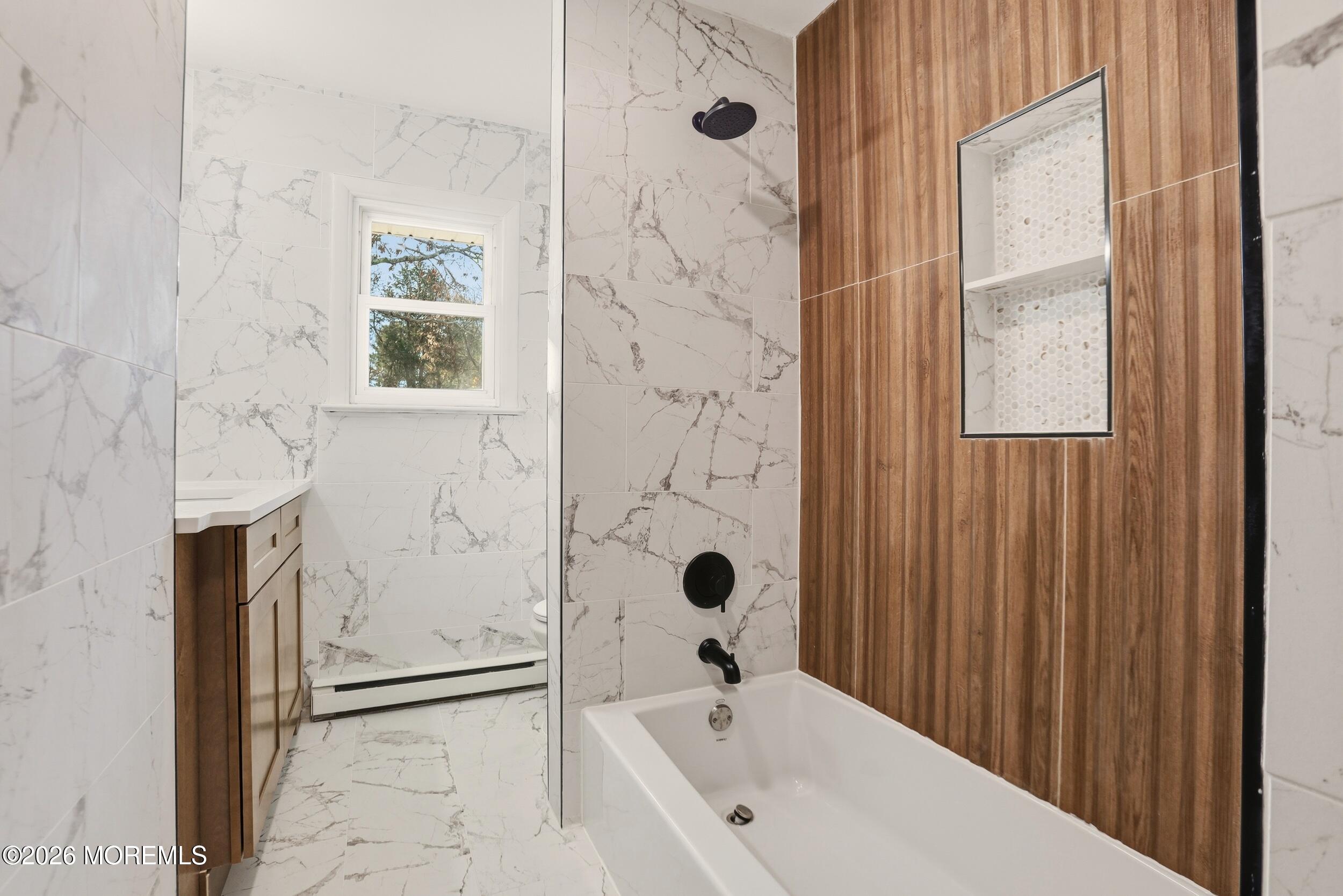 9 Riccis Drive Jackson, NJ 08527 - Photo 11 of 30 a bathroom with a bathtub and shower