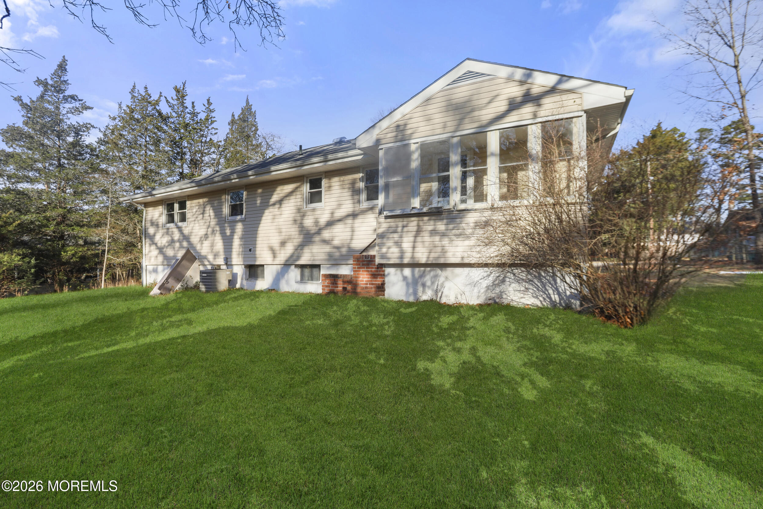 9 Riccis Drive Jackson, NJ 08527 - Photo 16 of 30 a front view of a house with garden