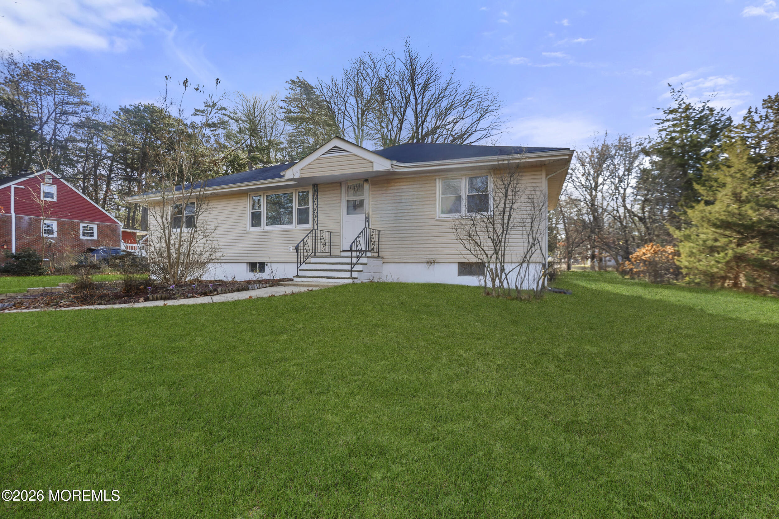 9 Riccis Drive Jackson, NJ 08527 - Photo 19 of 30 a front view of house with yard and seating area