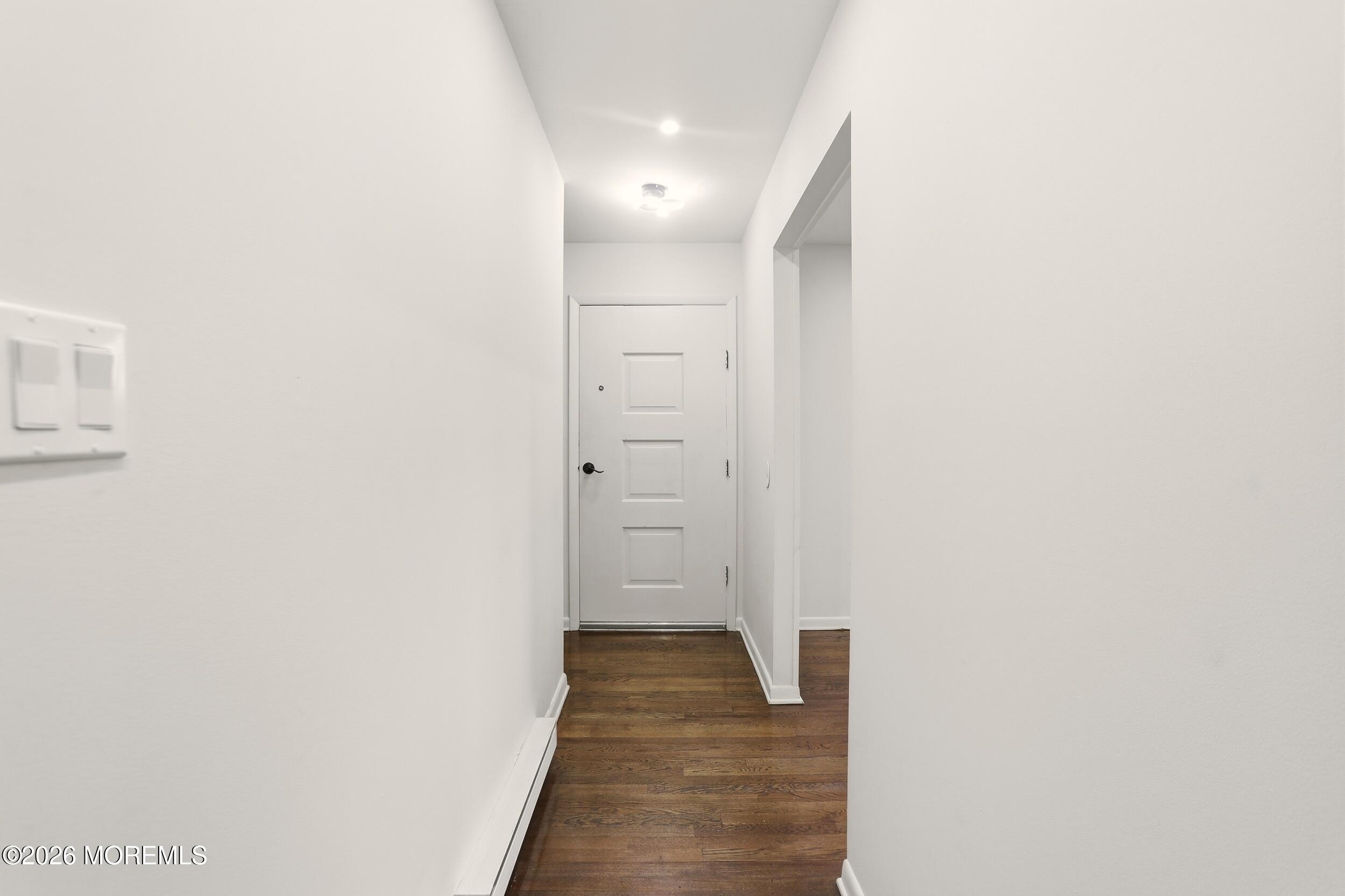 9 Riccis Drive Jackson, NJ 08527 - Photo 2 of 30 a view of a hallway with wooden floor