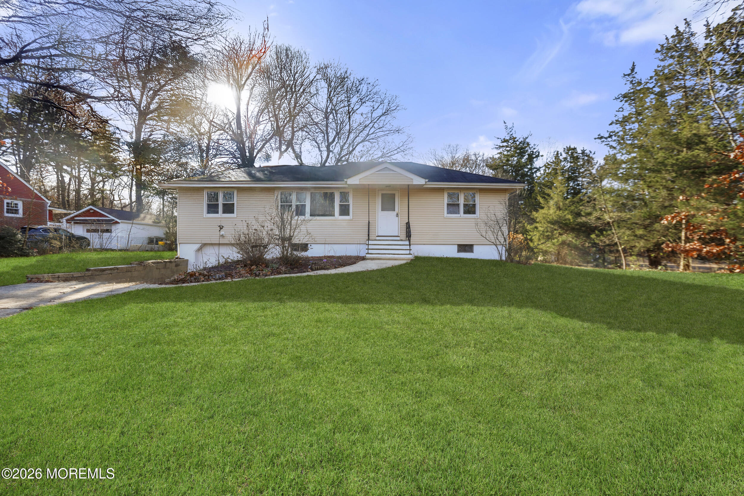 9 Riccis Drive Jackson, NJ 08527 - Photo 21 of 30 a front view of house with yard and green space