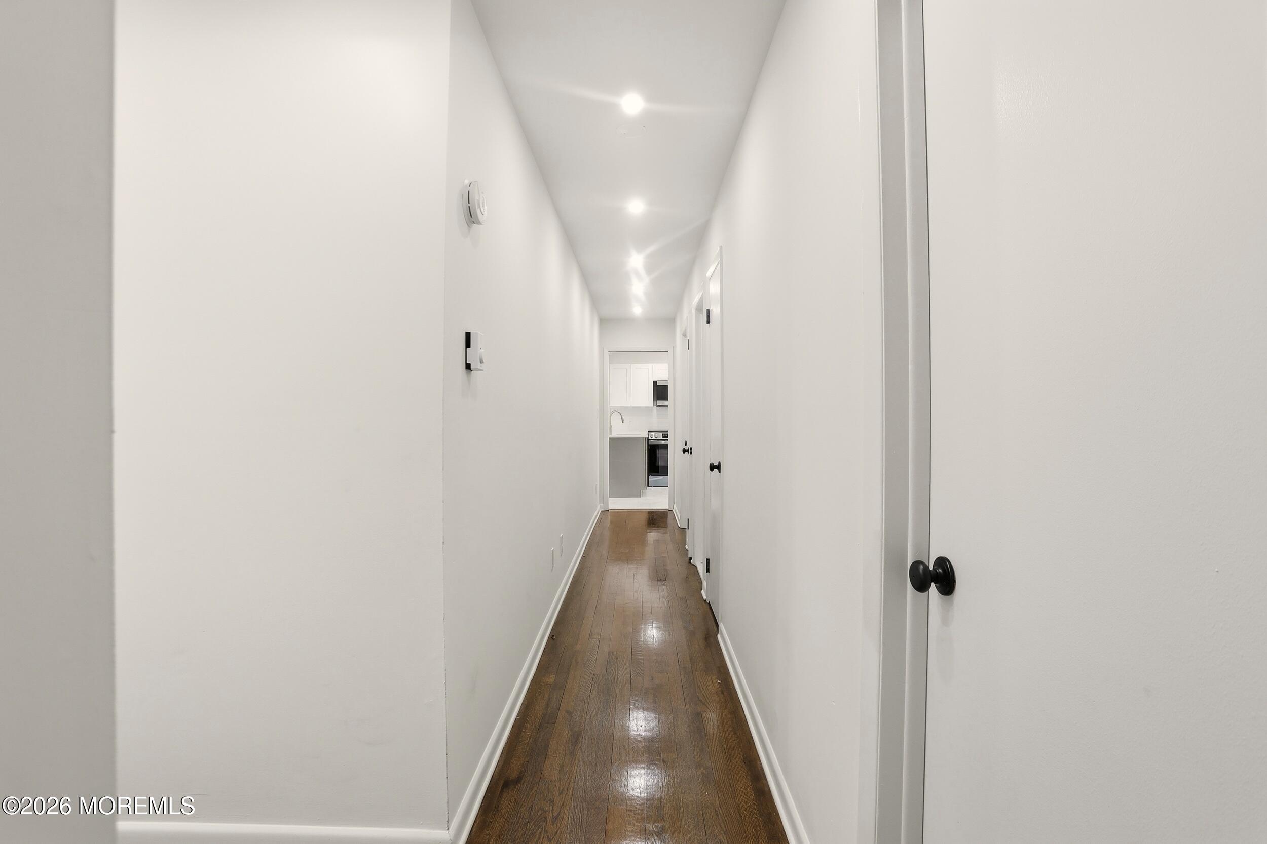 9 Riccis Drive Jackson, NJ 08527 - Photo 27 of 30 a view of a hallway with a white walls