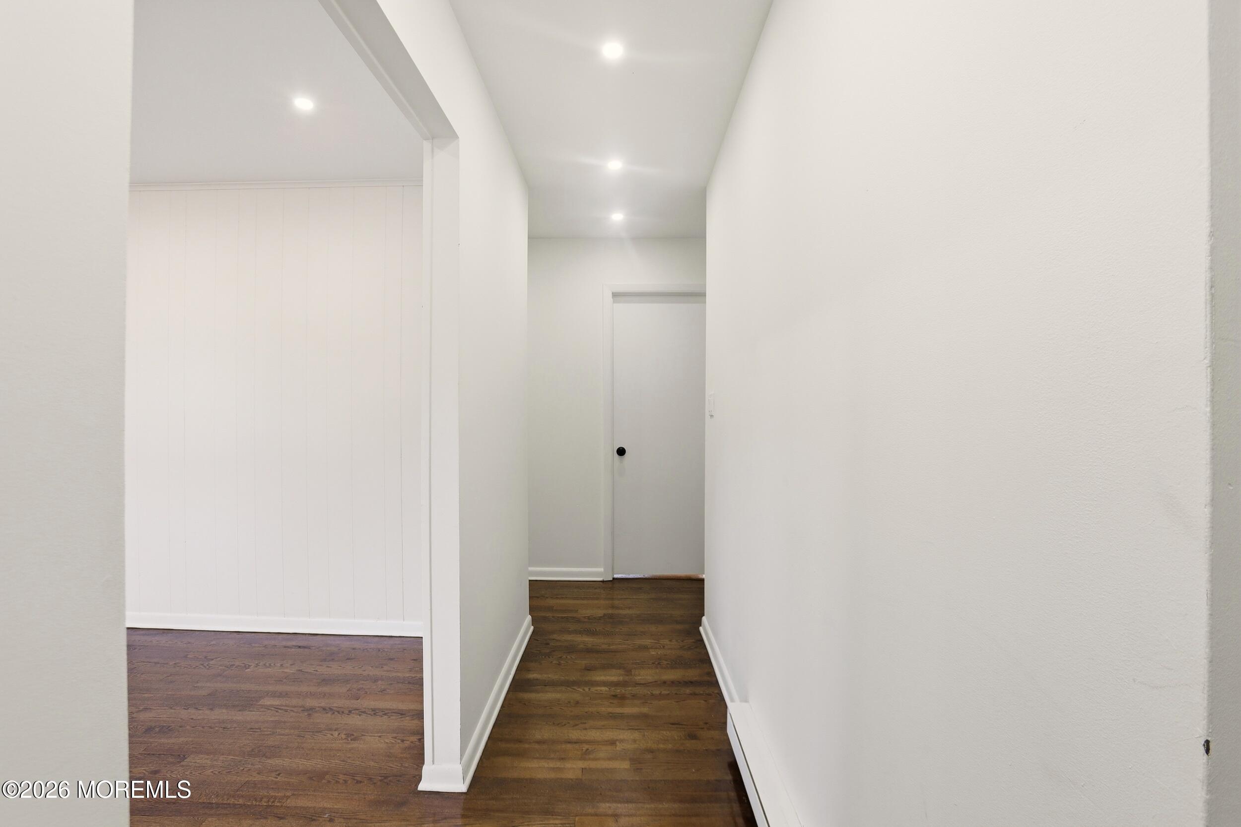 9 Riccis Drive Jackson, NJ 08527 - Photo 3 of 30 a view of a hallway with wooden floor