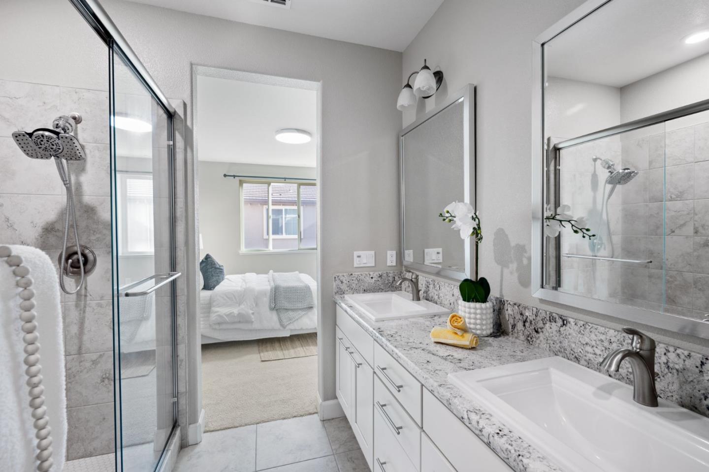 5977 Larkstone Loop San Jose, CA 95123 - Photo 32 of 63 a spacious bathroom with a granite countertop tub sink and mirror