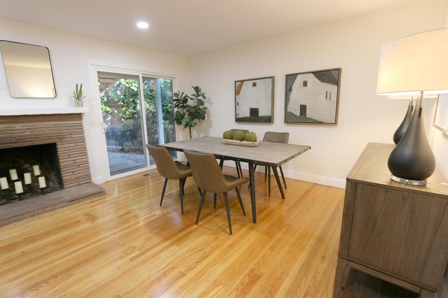1104 Phyllis Avenue Mountain View, CA 94040 - Photo 3 of 12 a view of a dining room with furniture and wooden floor