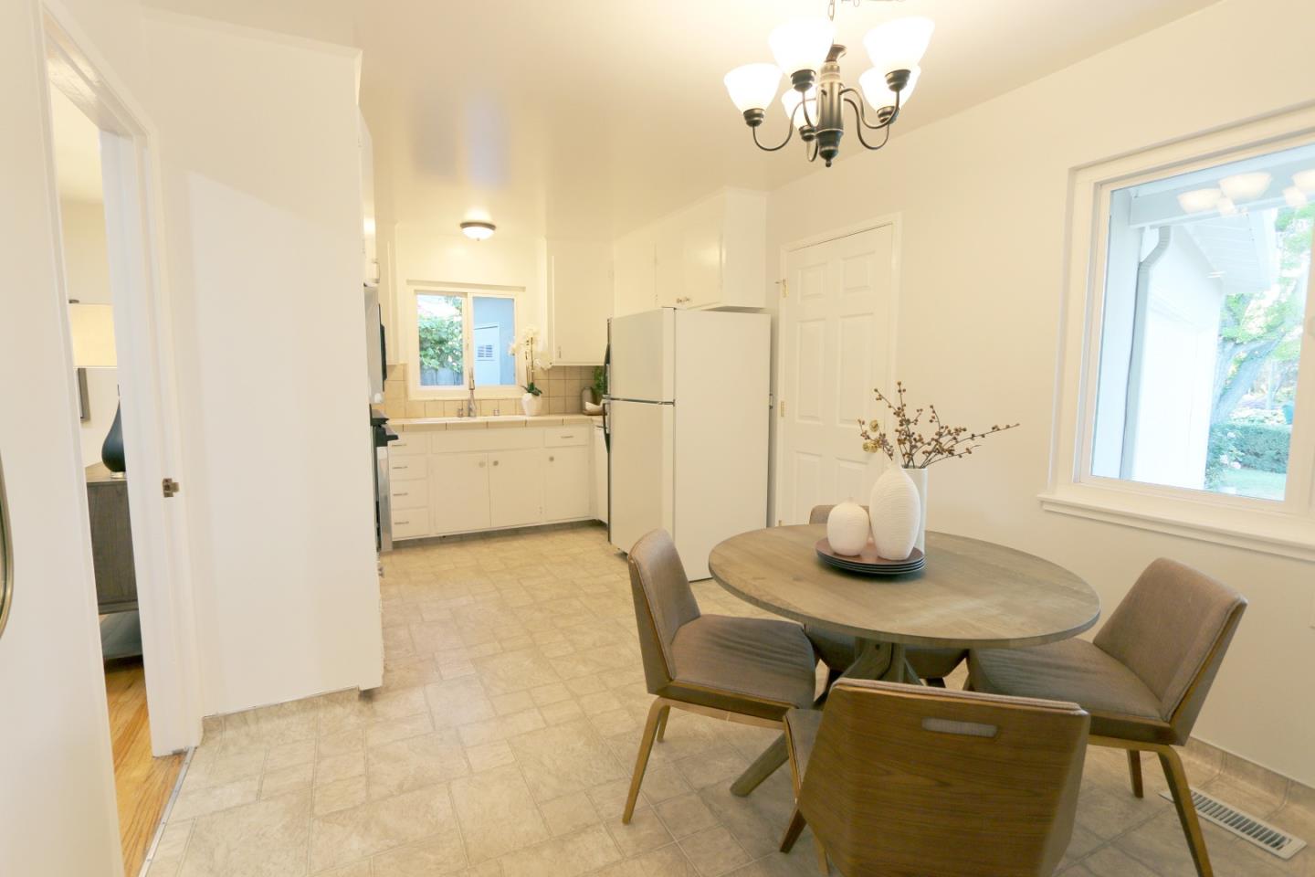 1104 Phyllis Avenue Mountain View, CA 94040 - Photo 4 of 12 a dining room with furniture and window