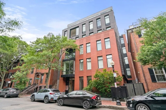 a car parked in front of a building