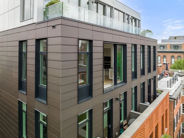a view of a building from a balcony
