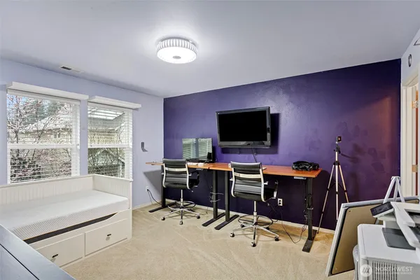 a view of a workspace with furniture