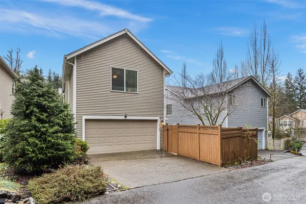 a front view of a house with a garage