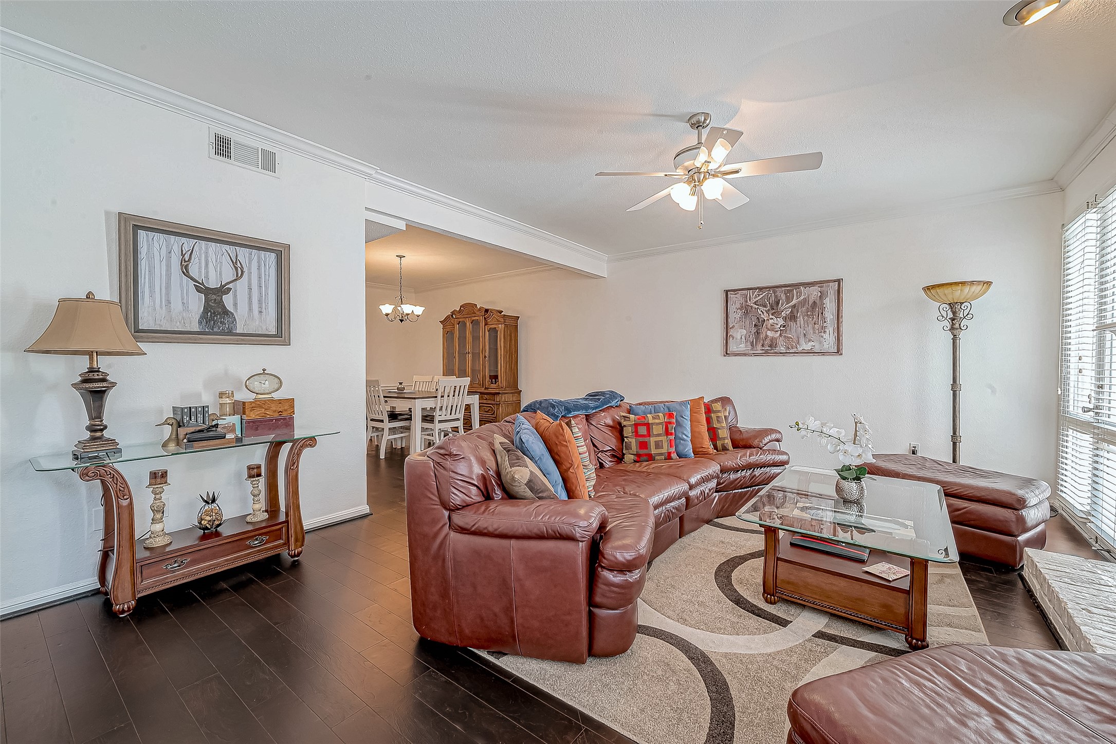 2100 Tanglewilde Street, Unit 189 Houston, TX 77063 - Photo 7 of 31 Large family room with wood laminate flooring