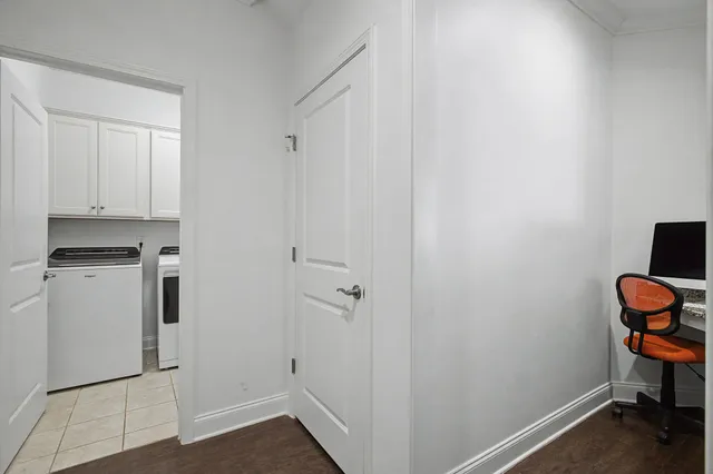 a bedroom with a bed and dresser