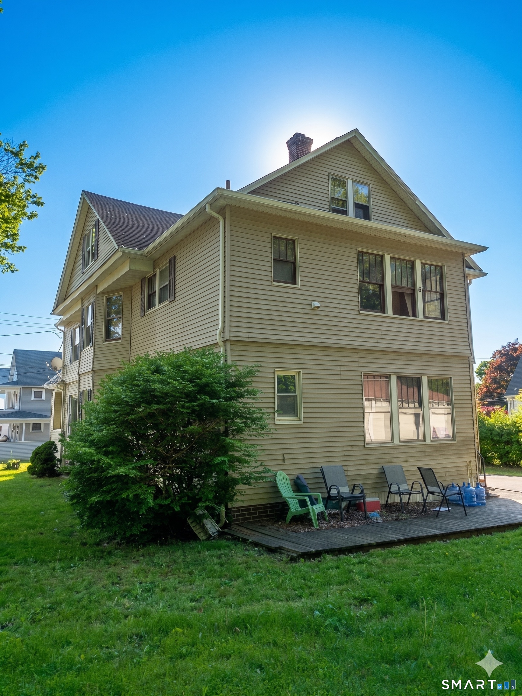 44 Bird Street Torrington, CT 06790 - Photo 2 of 17 a front view of a house with a garden
