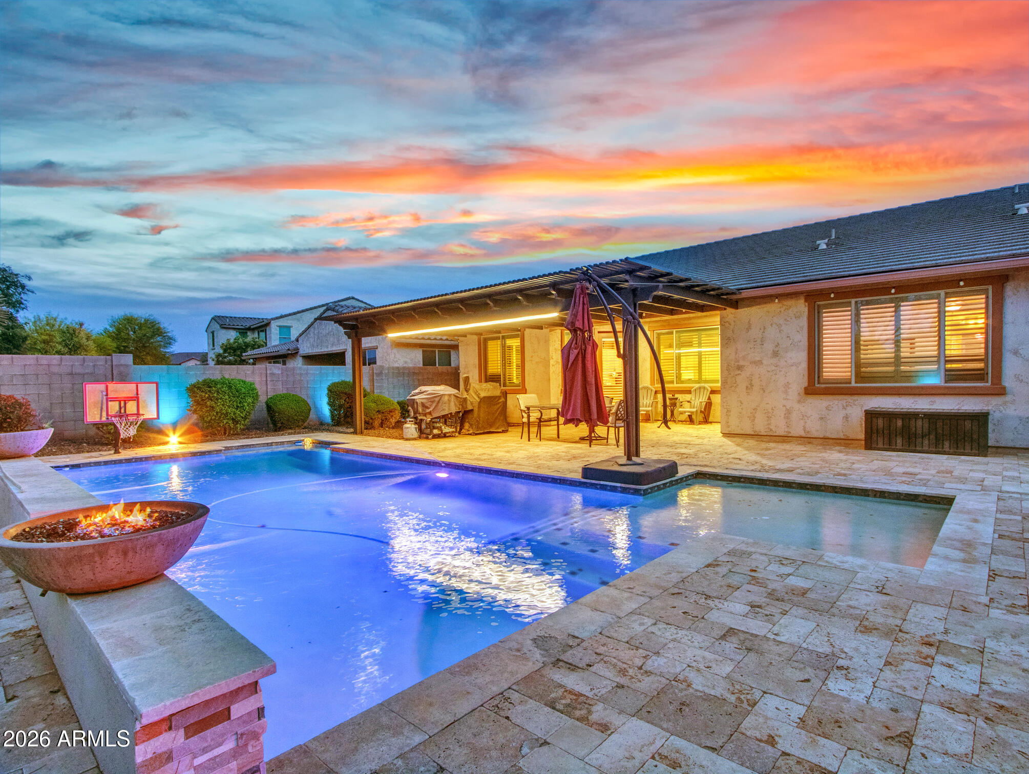 18216 West Montecito Avenue Goodyear, AZ 85395 - Photo 25 of 26 Evening_03_Backyard-&-Pool-(9)