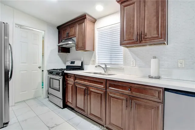 a view of a dining room furniture and window