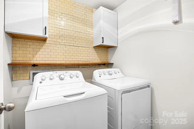 a utility room with dryer and washer