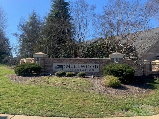 a view of a garden with a bench