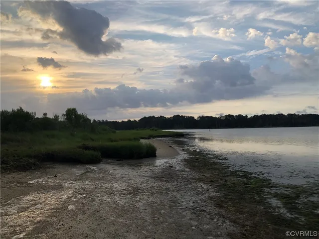 a view of a balcony with chairs and a table