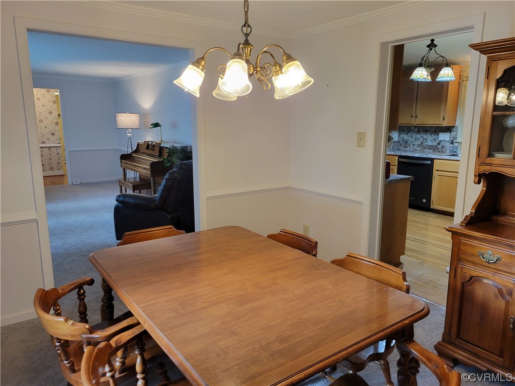 10301 Robbie Road Chesterfield, VA 23832 - Photo 12 of 21 a kitchen with a table and chairs in it