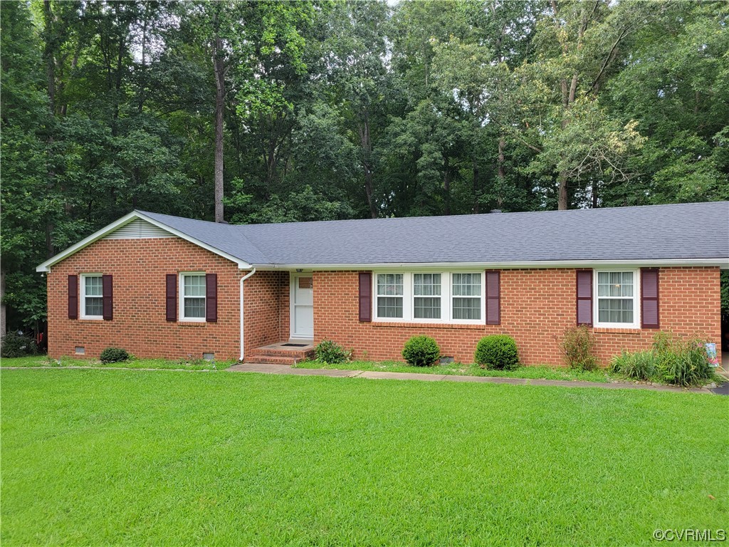 10301 Robbie Road Chesterfield, VA 23832 - Photo 3 of 21 a front view of a house with garden