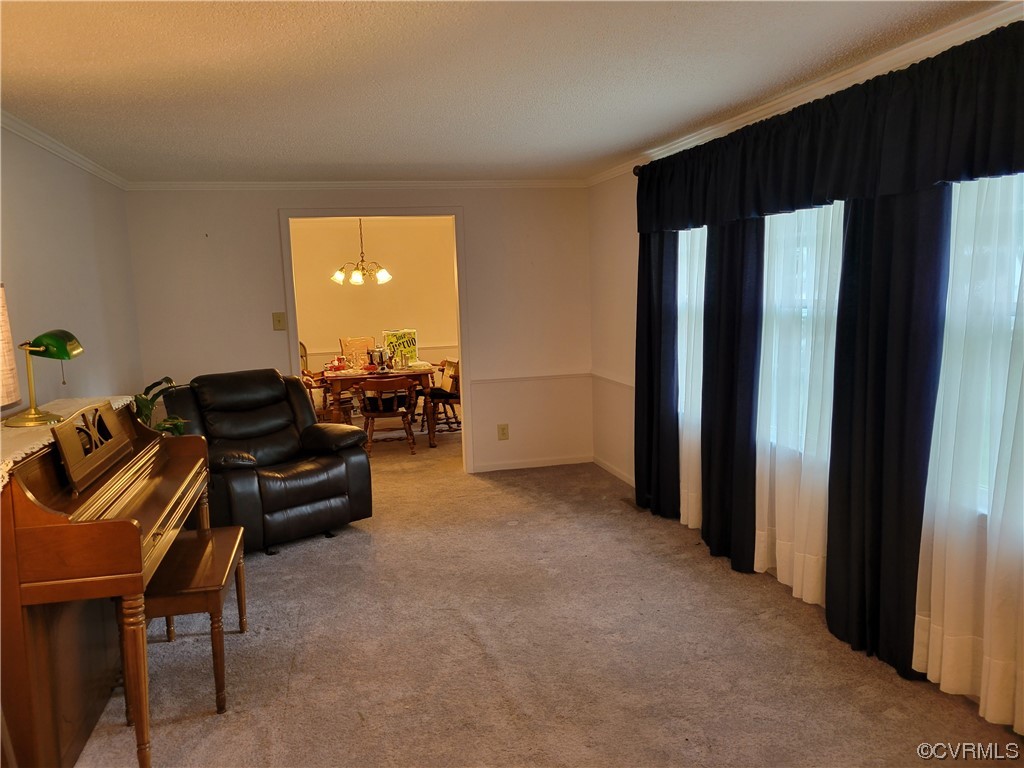 10301 Robbie Road Chesterfield, VA 23832 - Photo 6 of 21 a living room with furniture and a large window