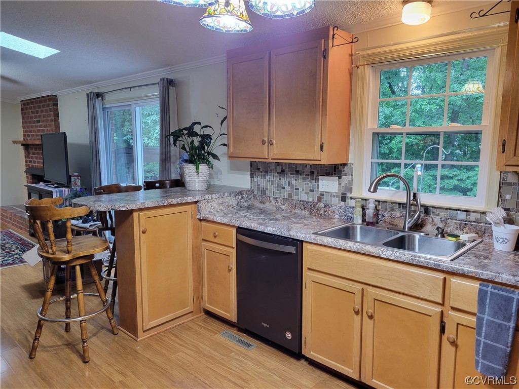 10301 Robbie Road Chesterfield, VA 23832 - Photo 9 of 21 a kitchen with a sink cabinets and window