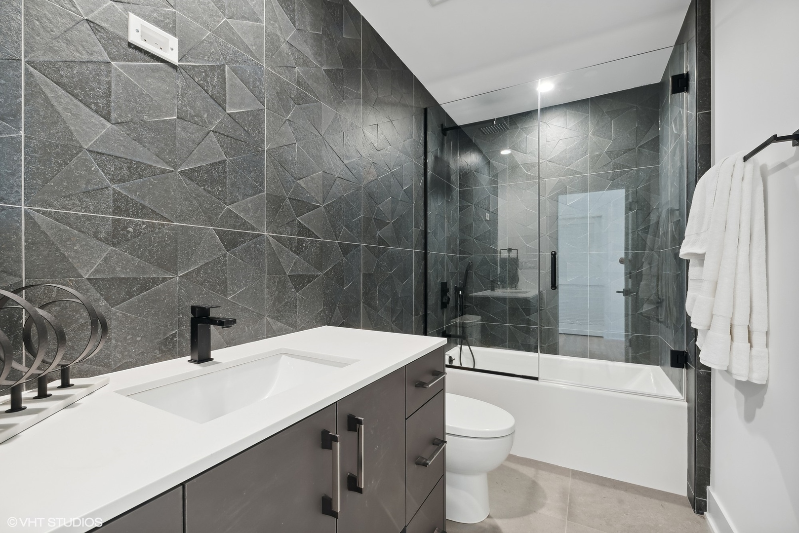 545 Voltz Road Northbrook, IL 60062 - Photo 54 of 65 a bathroom with a sink a toilet and shower