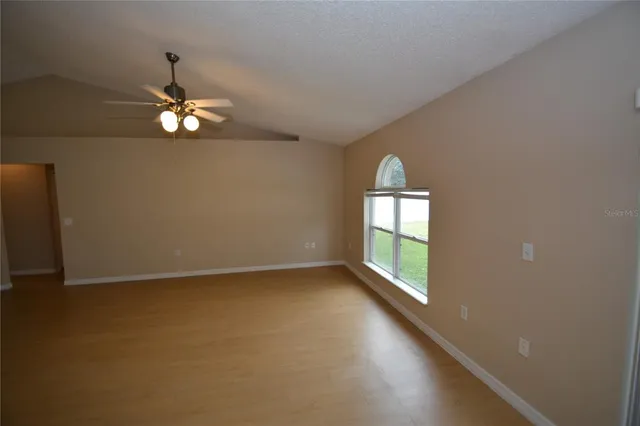 an empty room that has a window