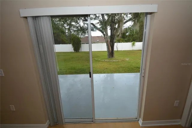 a view of swimming pool from a window