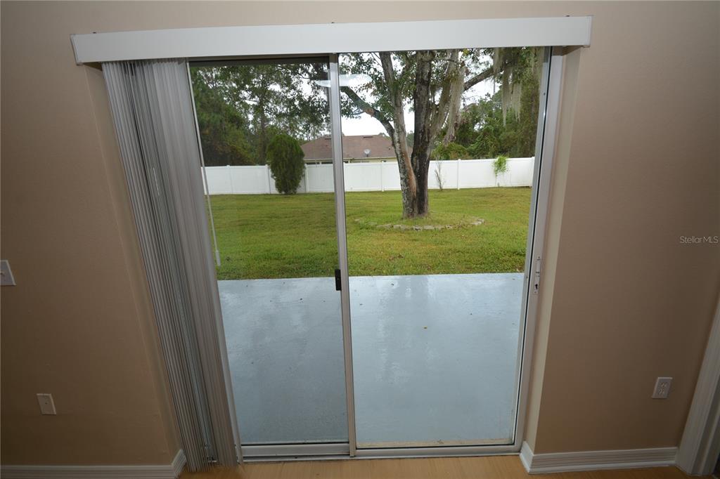5 Kathleen Trail Palm Coast, FL 32164 - Photo 16 of 38 a view of swimming pool from a window