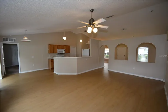 a view of a livingroom with a ceiling fan